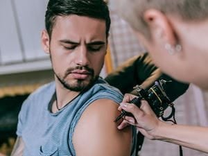 Man getting a tattoo